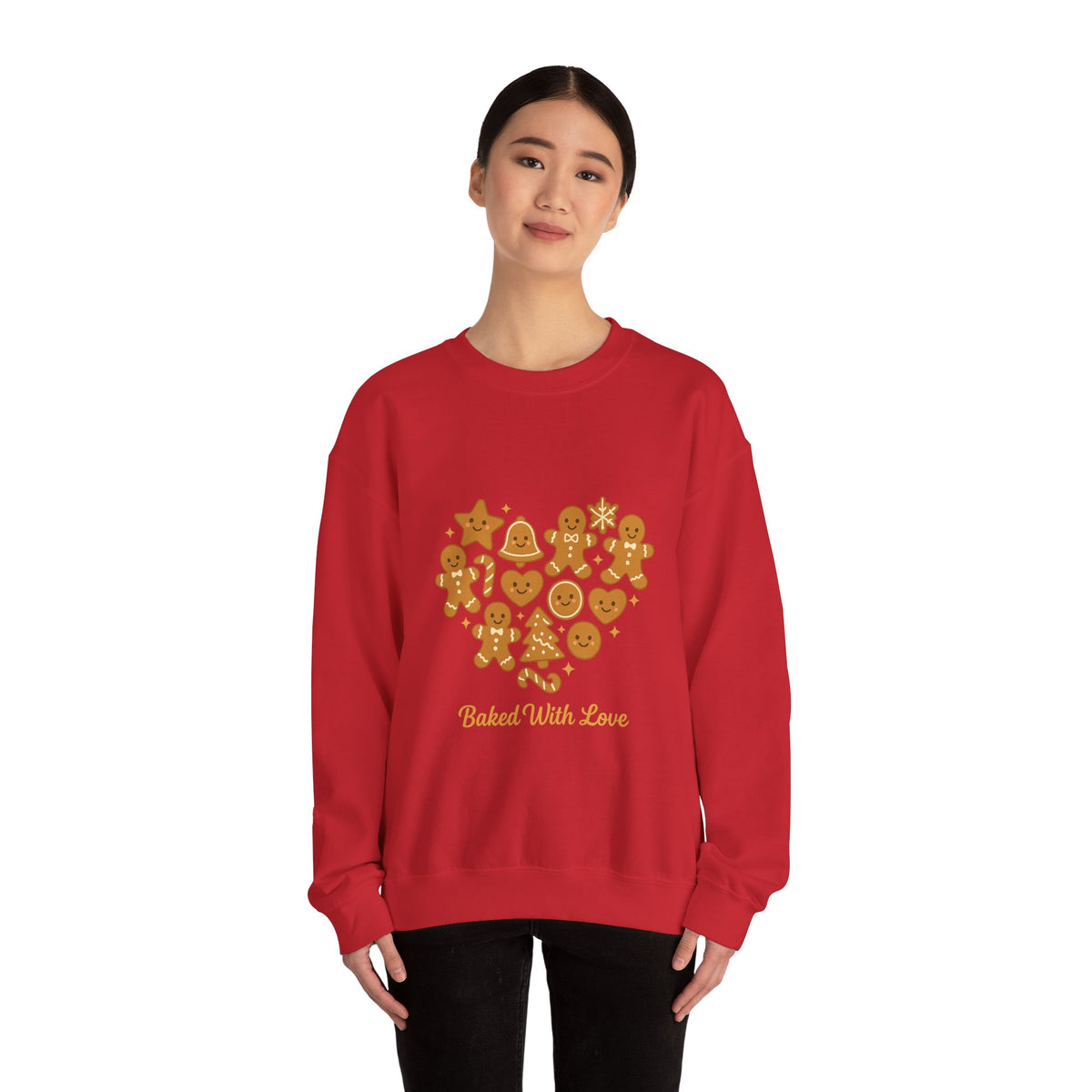 Model wearing a red Baked With Love gingerbread heart sweatshirt