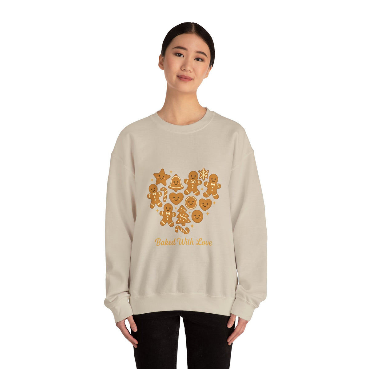 Model wearing a sand Baked With Love gingerbread heart sweatshirt