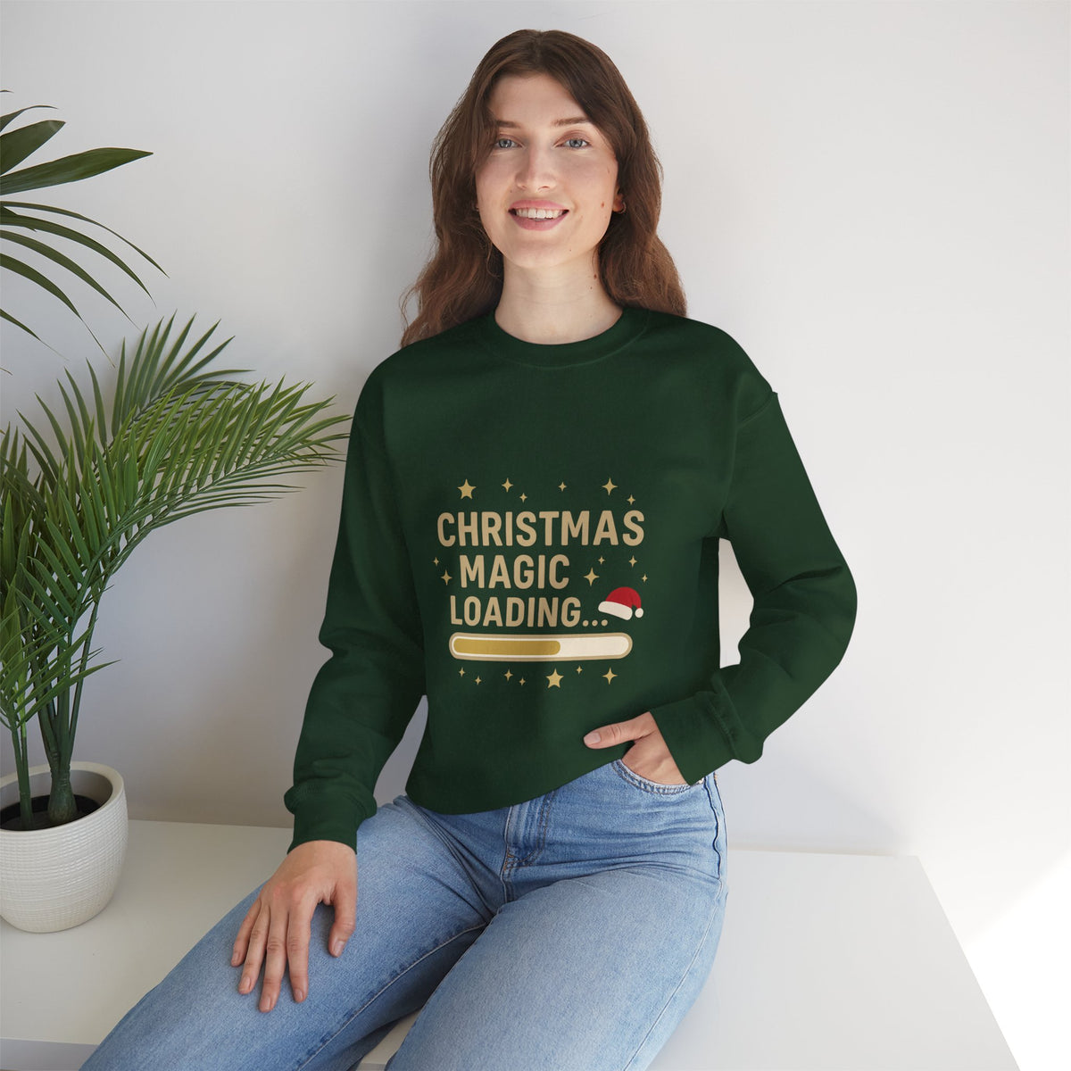 Model wearing a forest green Christmas Magic Loading Santa hat sweatshirt