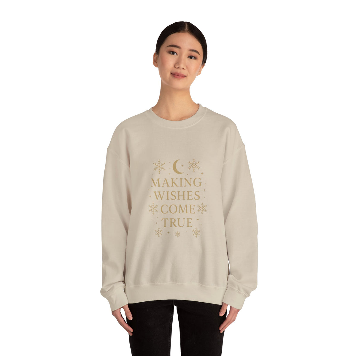 Model wearing a sand Making Wishes Come True moon and snowflake sweatshirt