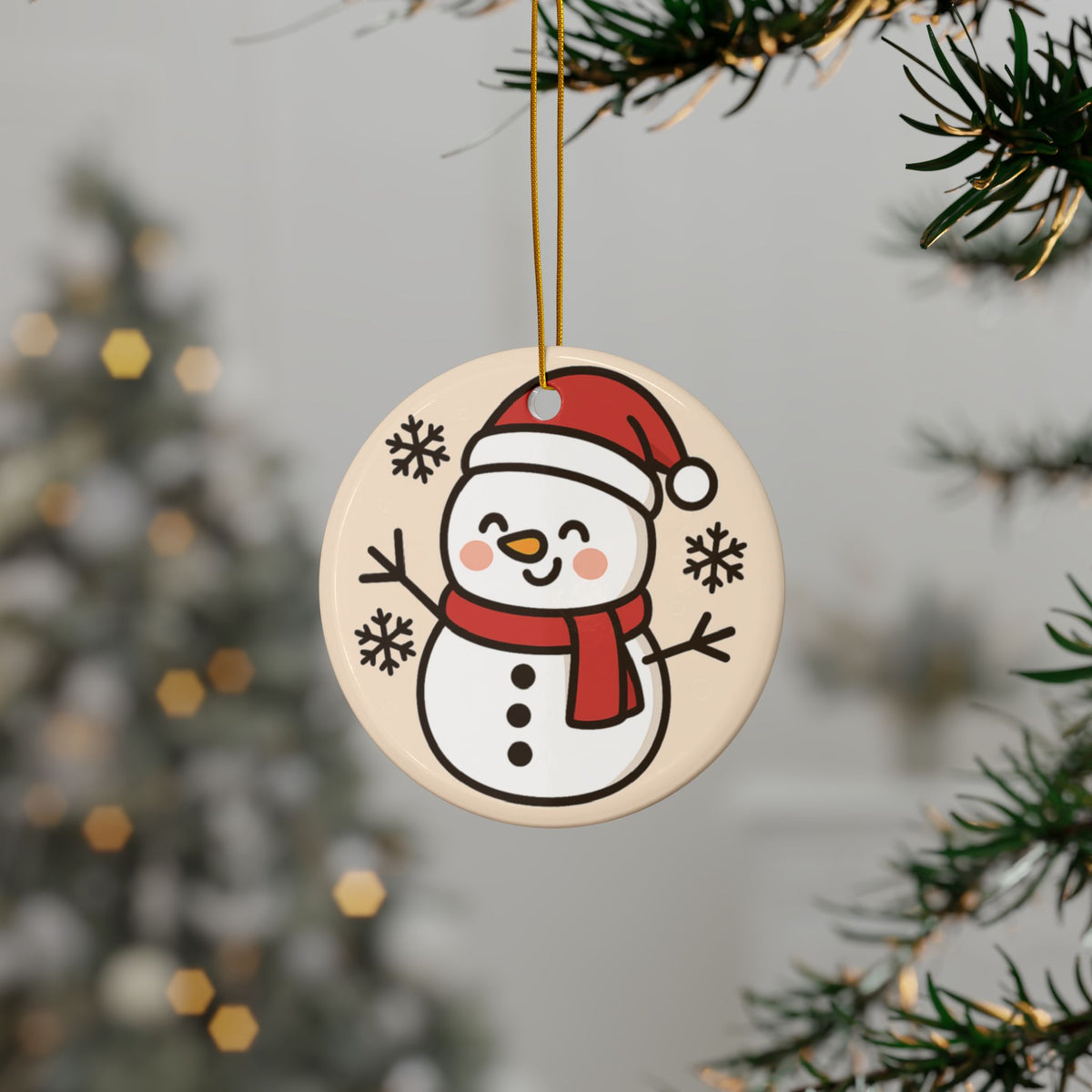 Circle-shaped smiling snowman ornament hanging on a Christmas tree