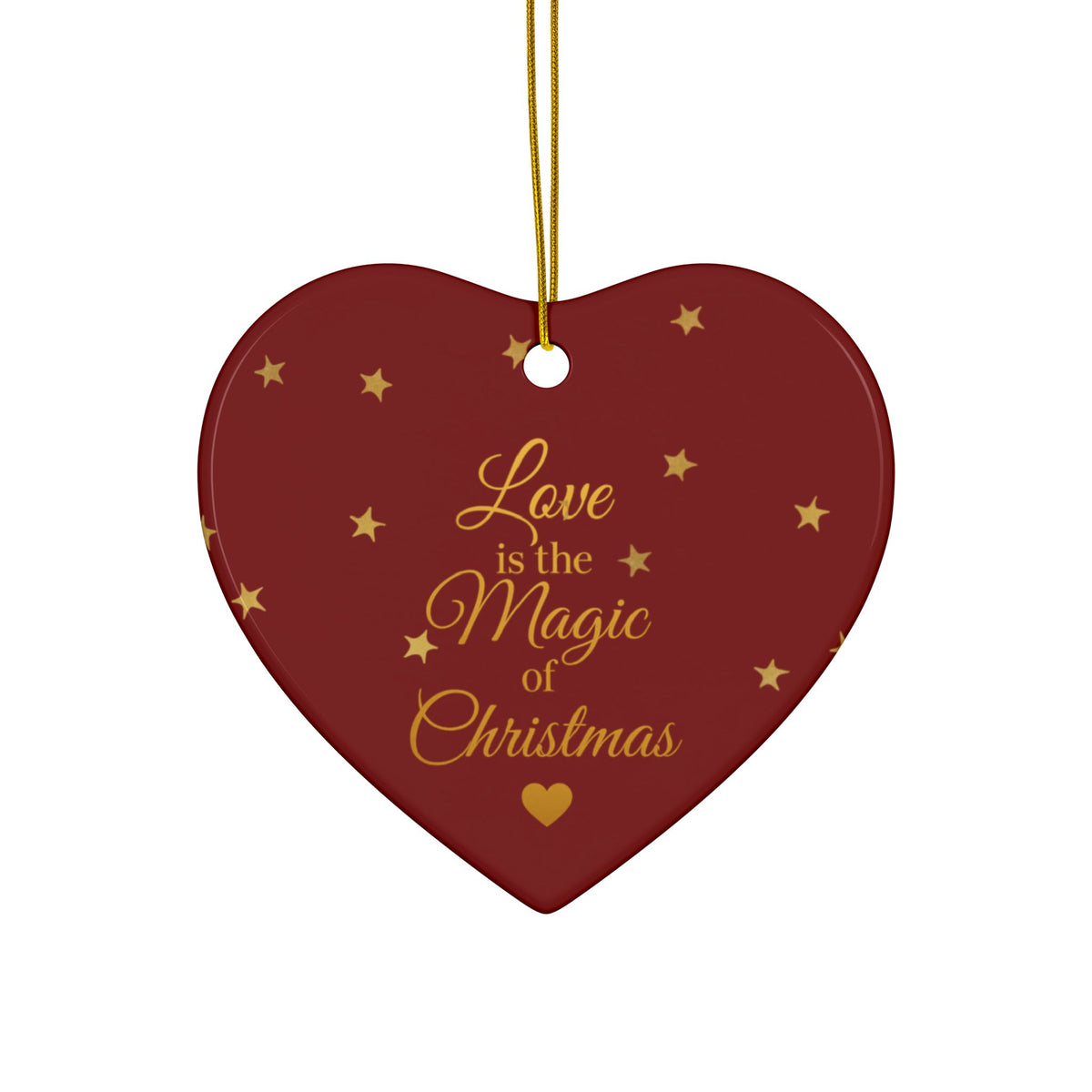 Red ceramic heart ornament with Love Is the Magic of Christmas script and gold-colored stars