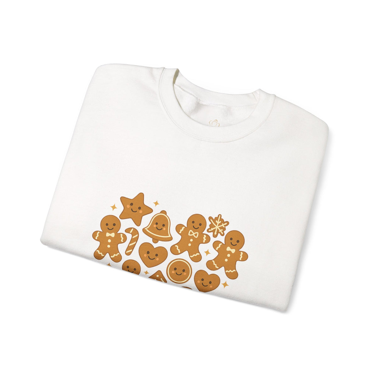 Folded white sweatshirt showing Baked With Love gingerbread heart print