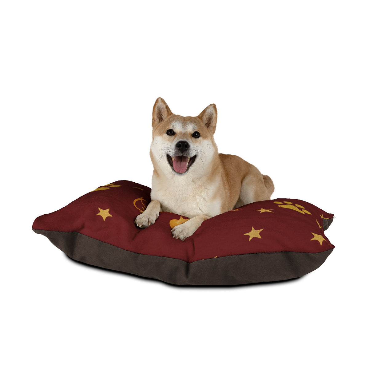 Dog resting on red Christmas pet bed