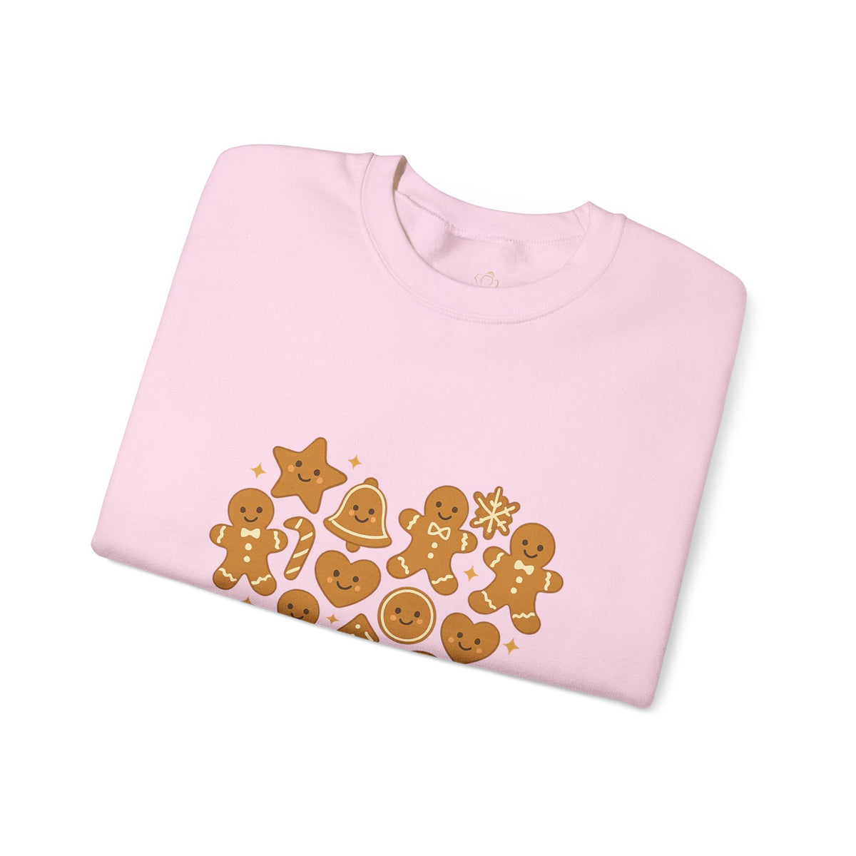 Folded light pink sweatshirt showing Baked With Love gingerbread heart print