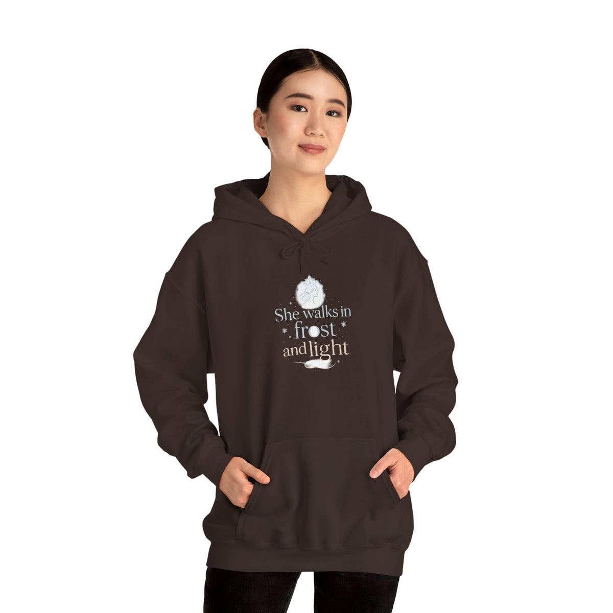 Model wearing a dark chocolate She Walks in Frost and Light hoodie