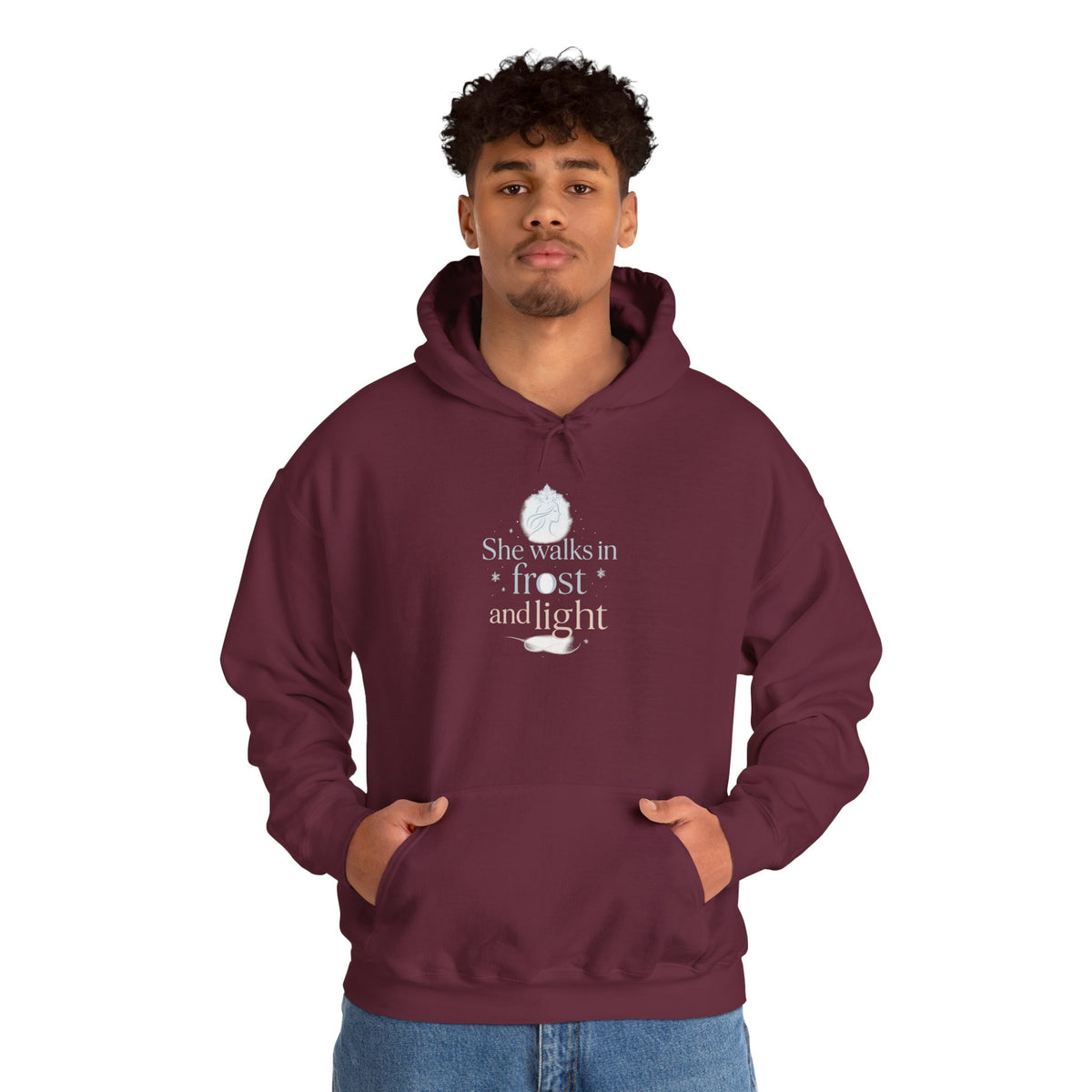 Model wearing a maroon She Walks in Frost and Light hoodie