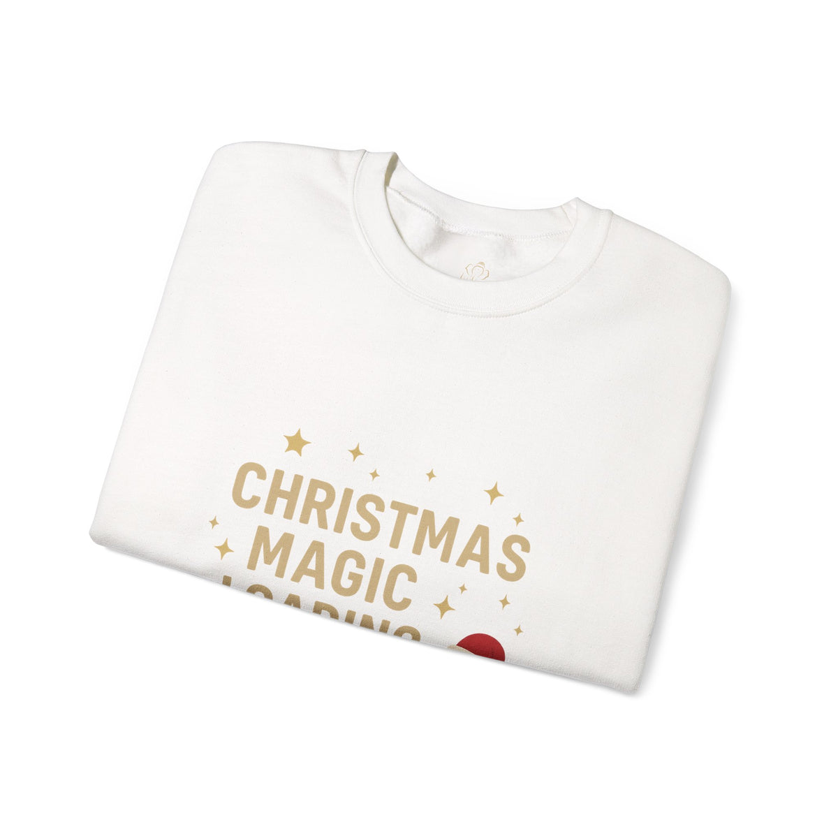 Folded white sweatshirt showing Christmas Magic Loading Santa hat print