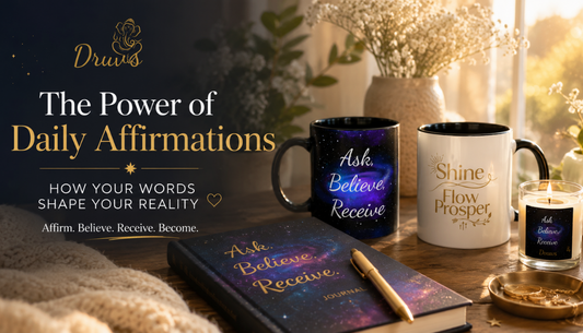 Daily affirmations workspace with Shine Flow Prosper mug, Prosper journal, candle, flowers, and warm morning sunlight by Druvs.