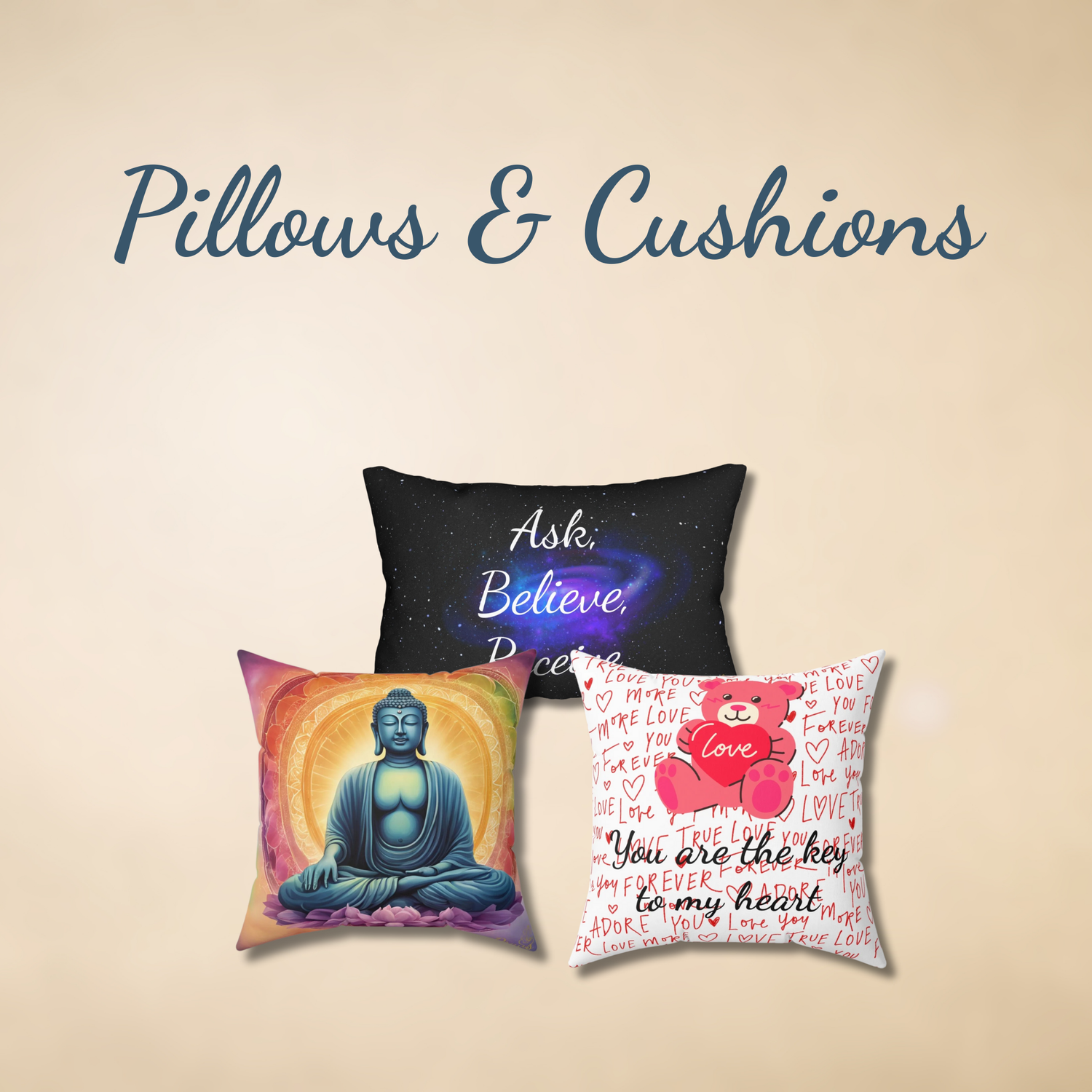 Square banner with the title ‘Pillows & Cushions’ in navy script over a soft beige background, featuring three decorative cushions: a cosmic “Ask. Believe. Receive.” pillow, a serene Buddha-print pillow, and a pink teddy-bear love pillow