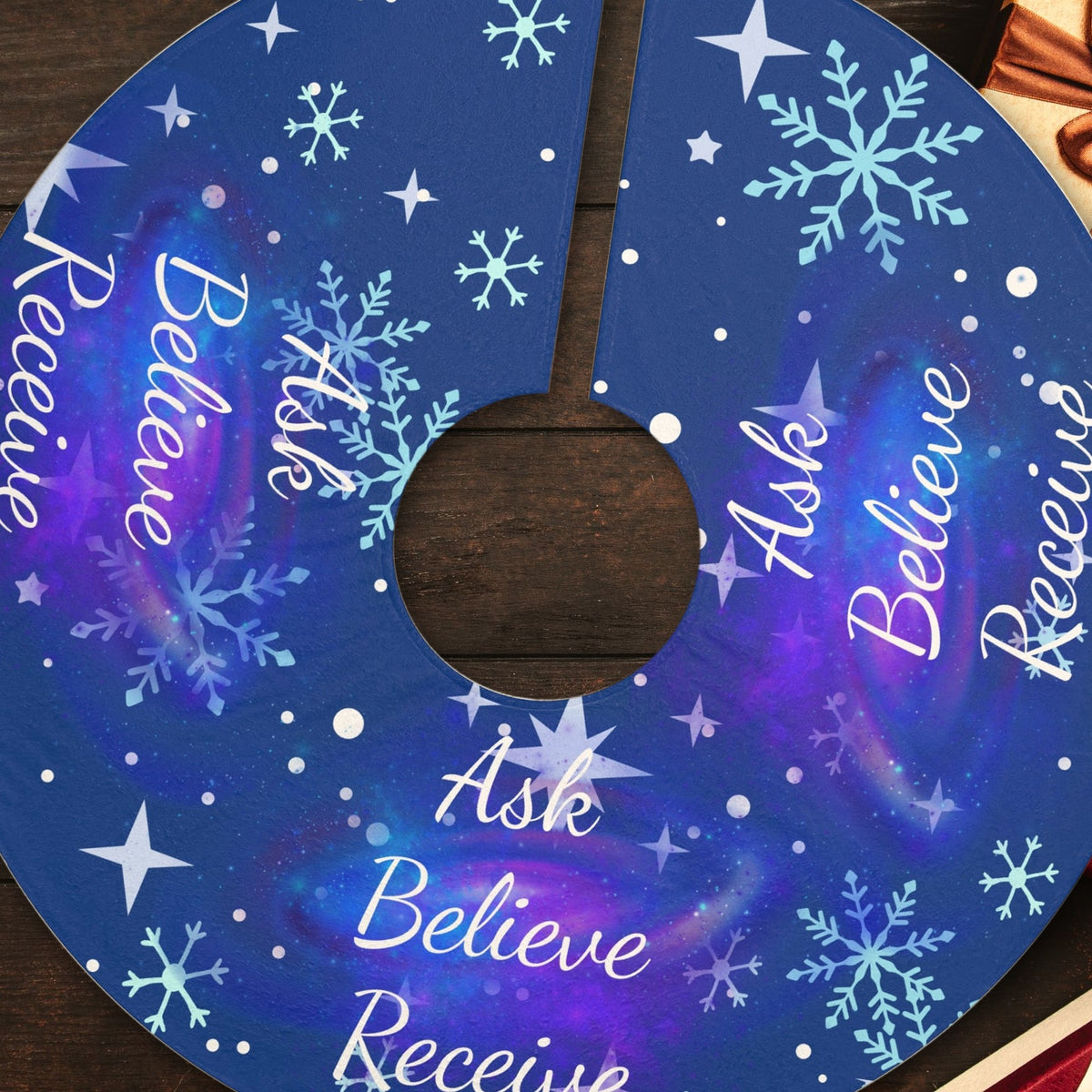 Close-up of the Ask Believe Receive cosmic Christmas tree skirt design