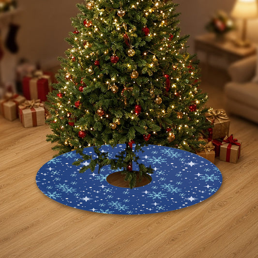 Blue Snowfall Christmas tree skirt under a decorated Christmas tree with wrapped gifts