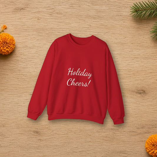 Holiday Cheer Christmas sweatshirt laid flat in a styled lifestyle setting