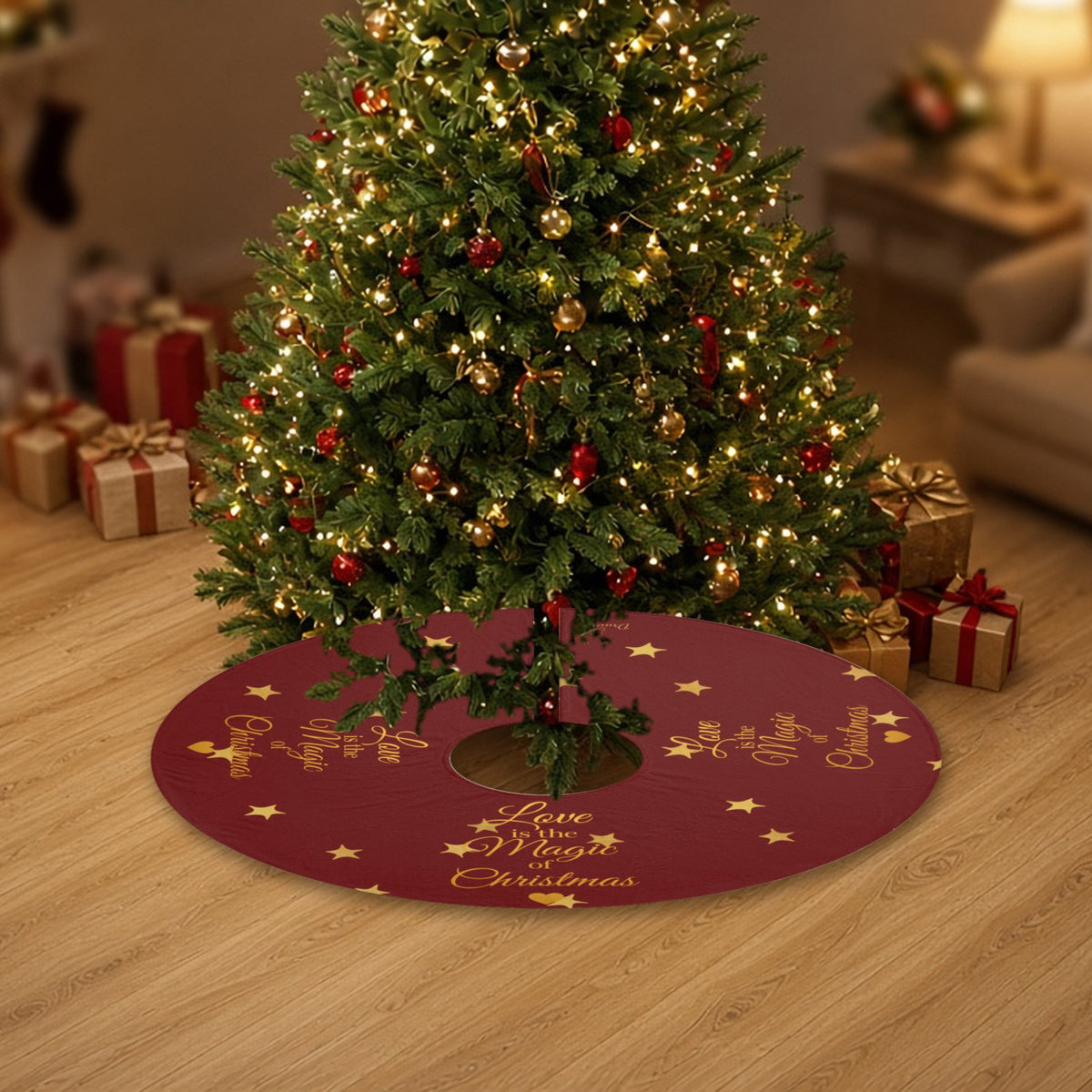 Love Is the Magic of Christmas red and gold Christmas tree skirt under a decorated Christmas tree with wrapped gifts