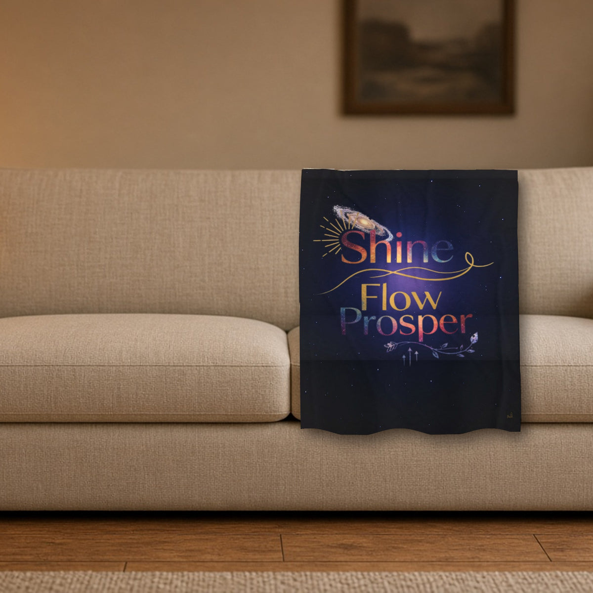 Shine Flow Prosper velveteen throw blanket styled on a sofa in a cozy living room