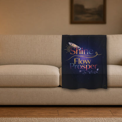 Shine Flow Prosper velveteen throw blanket styled on a sofa in a cozy living room