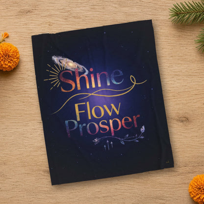 Shine Flow Prosper velveteen throw blanket laid flat in a styled lifestyle setting