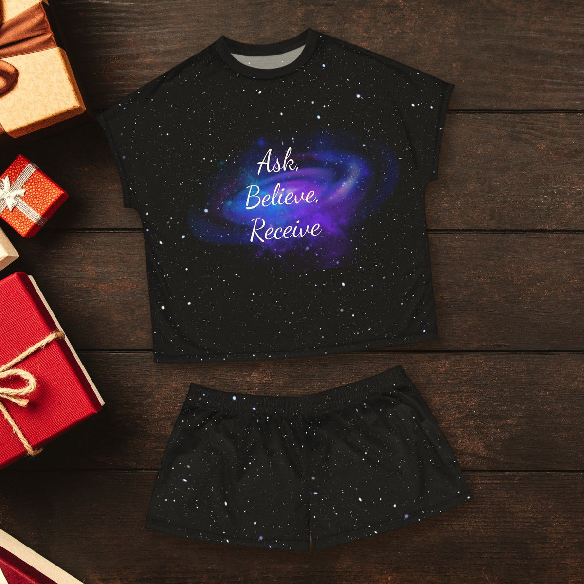 Ask Believe Receive Women's Pajama Set in a festive flat lay with wrapped Christmas gifts