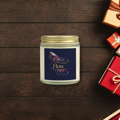 Shine Flow Prosper luxe cosmic scented candle surrounded by wrapped Christmas gifts