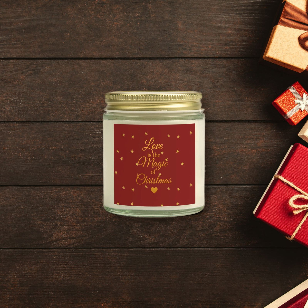 Love Is the Magic of Christmas Candle surrounded by wrapped Christmas gifts