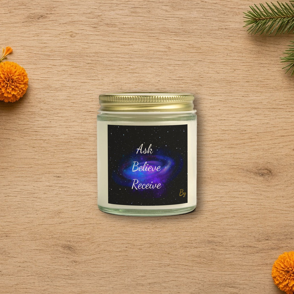 Ask Believe Receive Manifestation Candle styled on a cozy holiday table