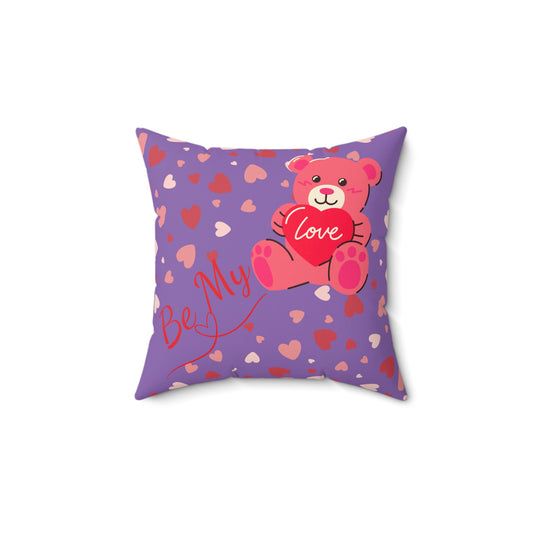 Purple square cushion with red and blush hearts, teddy bear holding a heart, and “Be My Love” romantic text.