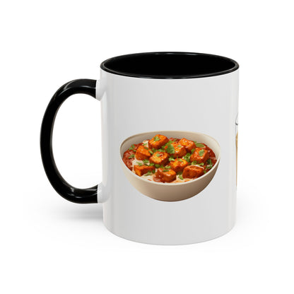 Two-tone ceramic mug with illustrations of paneer curry, a glass of chai, and dosa with chutneys, printed on white mug with black handle.