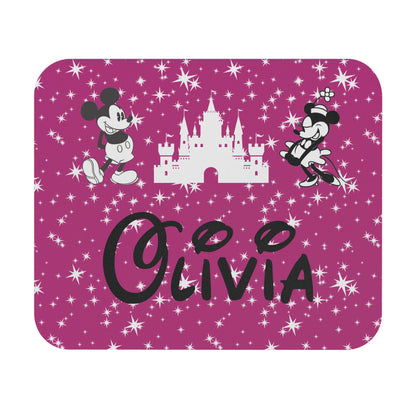 Disney-inspired pink mousepad with starry background, white castle, Mickey & Minnie silhouettes, and name “Olivia” in custom font with mouse ears.