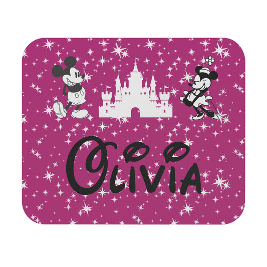 Disney-inspired pink mousepad with starry background, white castle, Mickey & Minnie silhouettes, and name “Olivia” in custom font with mouse ears.