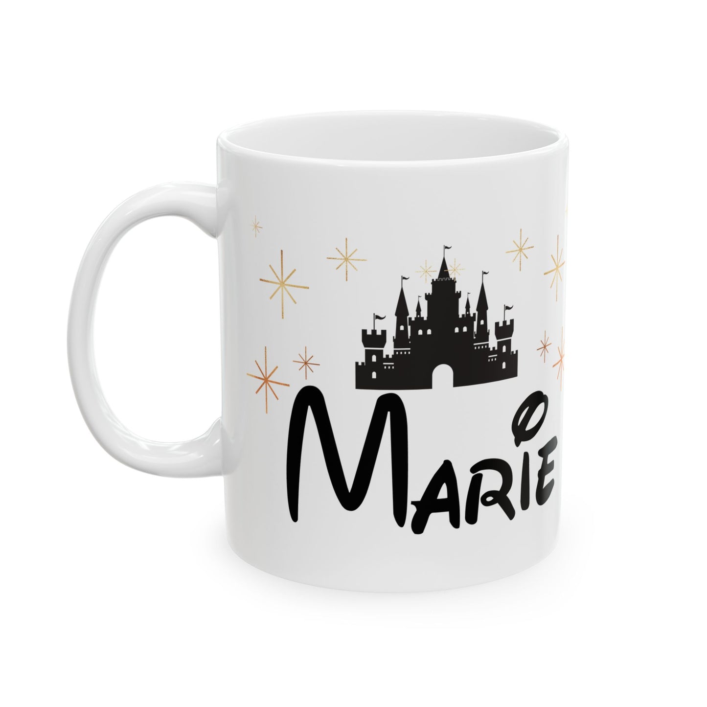 White ceramic mug with black castle, gold stars, and custom name "Marie" in fantasy-style font.