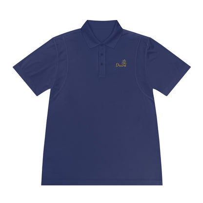 Navy blue unisex polo shirt with gold embroidered Druvs logo on the chest, featuring a Ganesha icon.