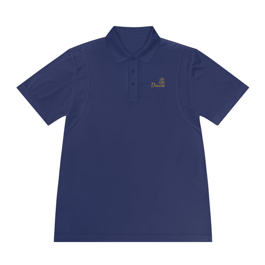 Navy blue unisex polo shirt with gold embroidered Druvs logo on the chest, featuring a Ganesha icon.