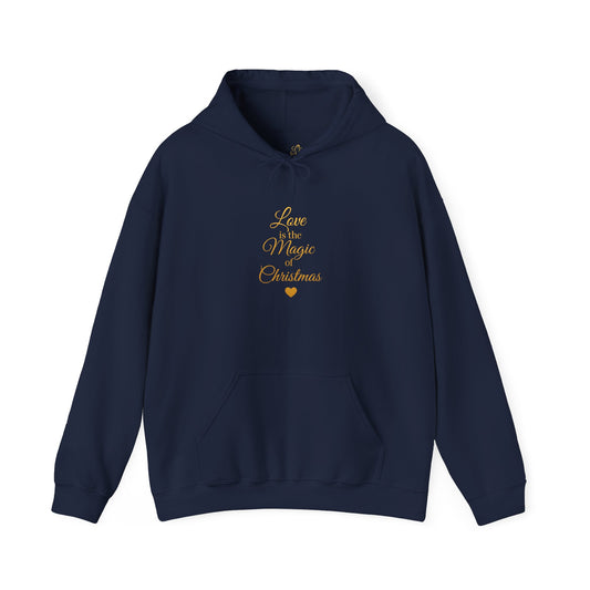 Navy hoodie with the quote “Love is the Magic of Christmas” in gold script, heart accent. Cozy unisex holiday sweatshirt perfect for gifts or festive wear.