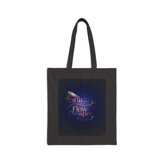 Black tote bag with Shine Flow Prosper cosmic quote in galaxy colors on starry background – spiritual gift by Druvs