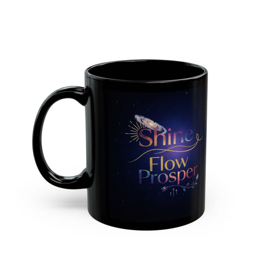Black ceramic mug with Shine Flow Prosper cosmic quote in galaxy gradient – spiritual coffee cup by Druvs
