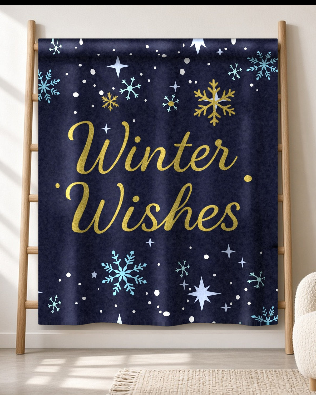 Winter Wishes navy and gold sherpa blanket draped on an oak ladder in a bright living room